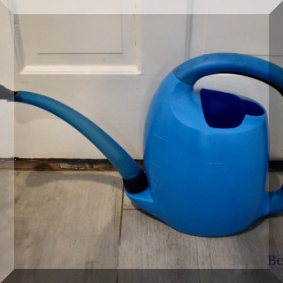 L03. Oxo blue ”Pour and Store” watering can. - $6